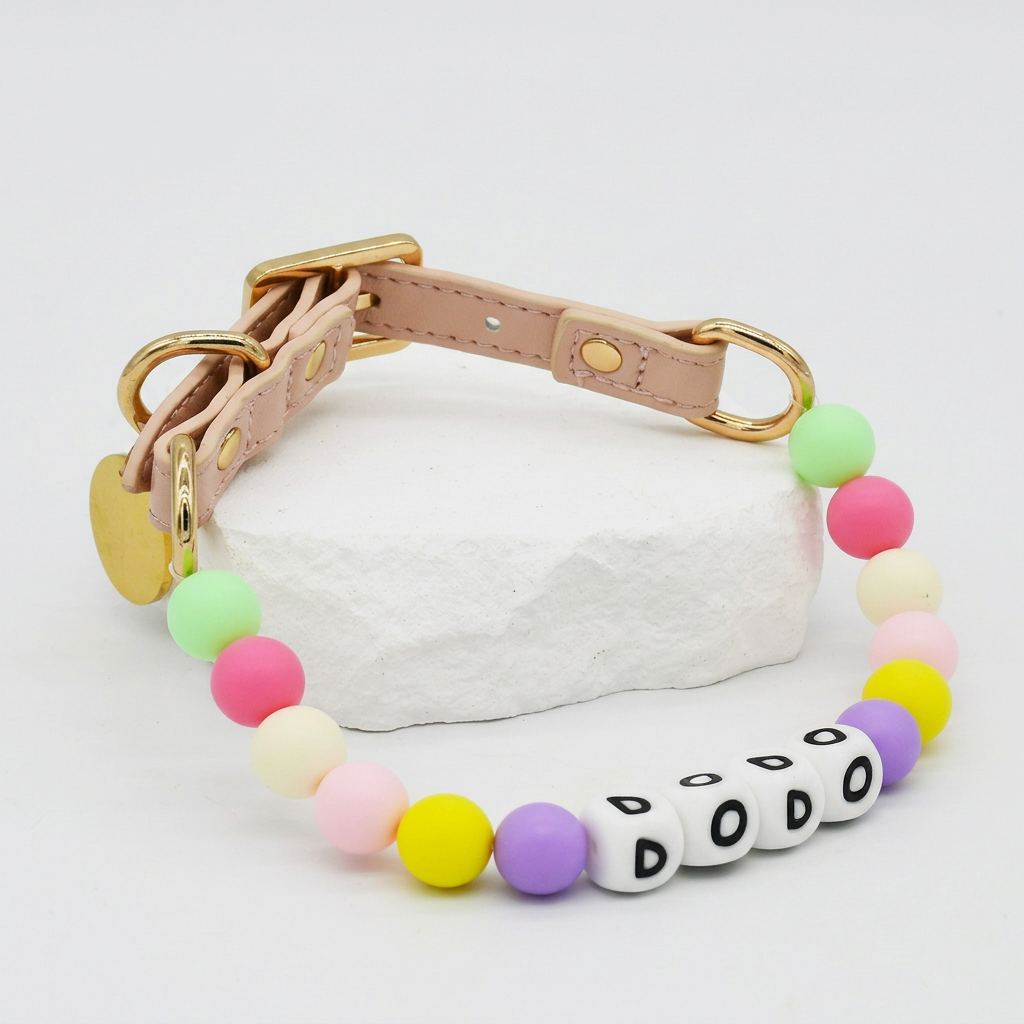 Close-up of colorful letter beads and premium leather strap on Petailor custom collar